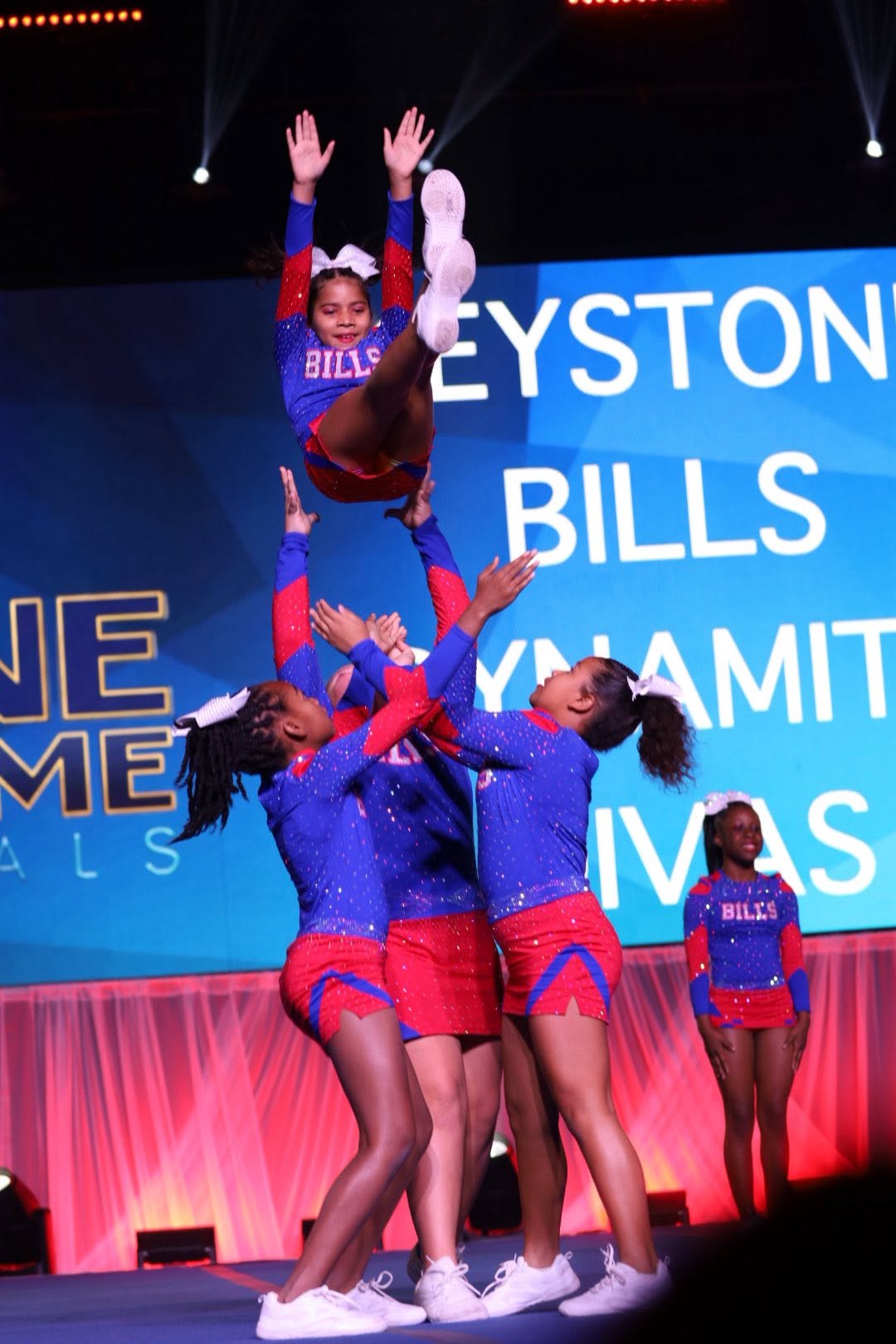 Dynamite Divas performing a stunt at nationals